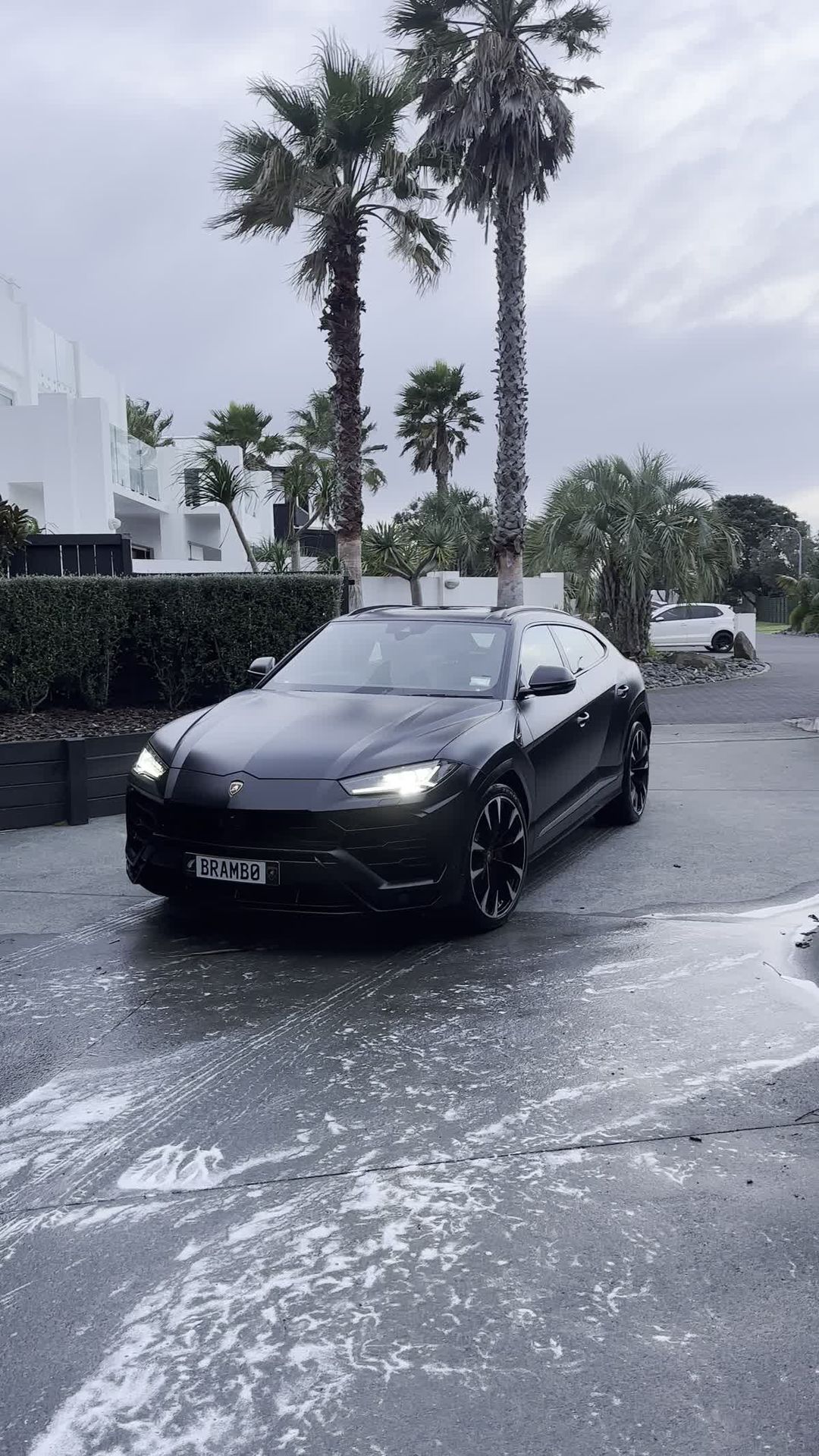 Lamborghini Urus headlights on after detail